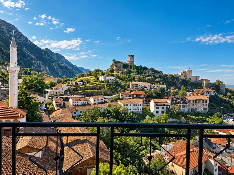 Krujë old town below the castle and clock tower, seen from a balcony above the bazaar